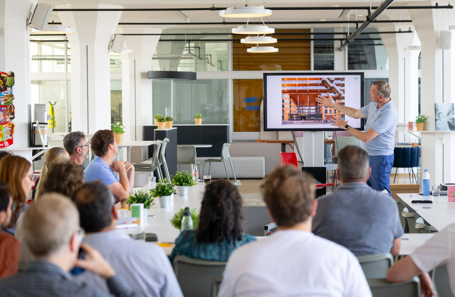 Speaker presenting a building project on screen to the chapter audience