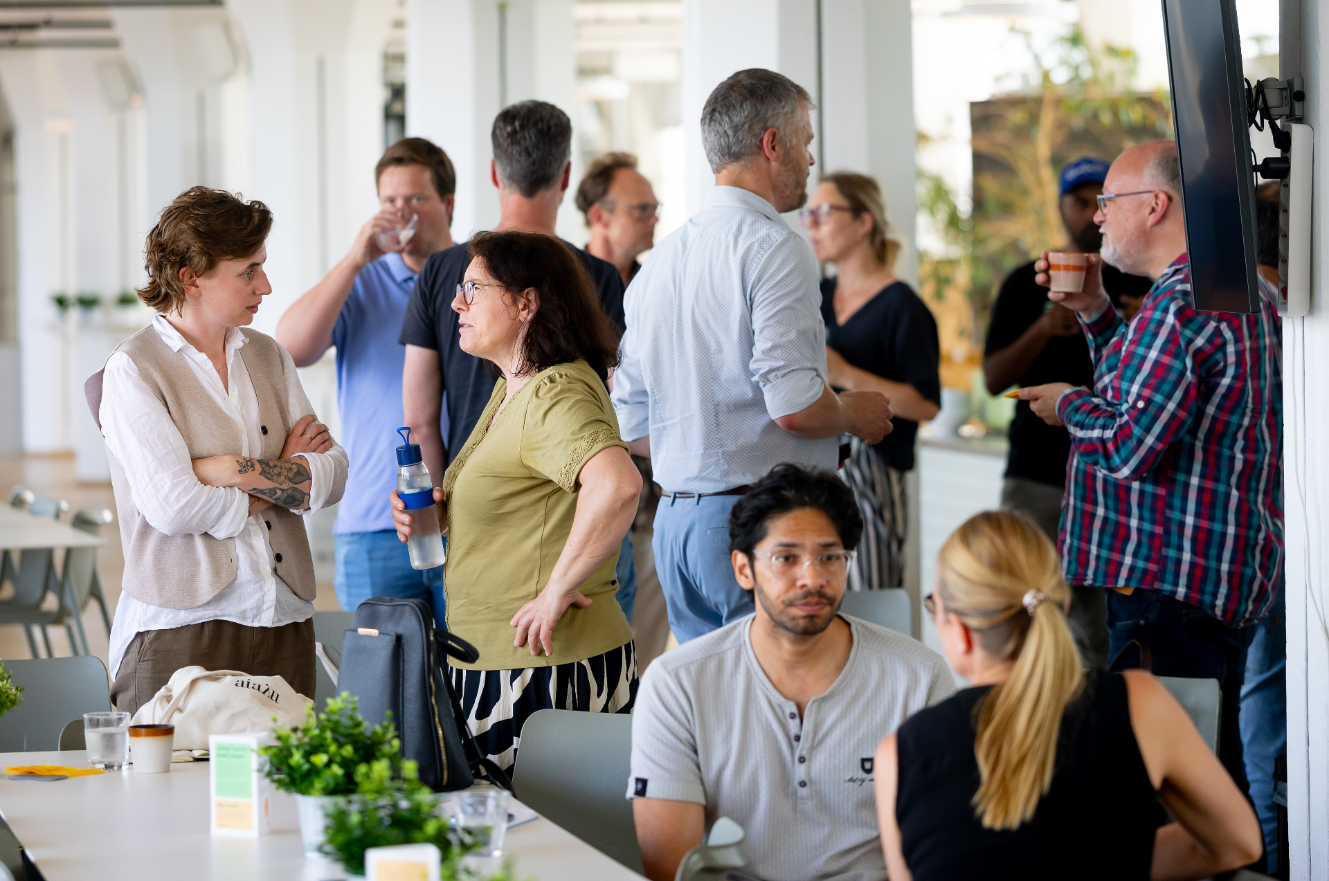 Attendees in conversation during a chapter break