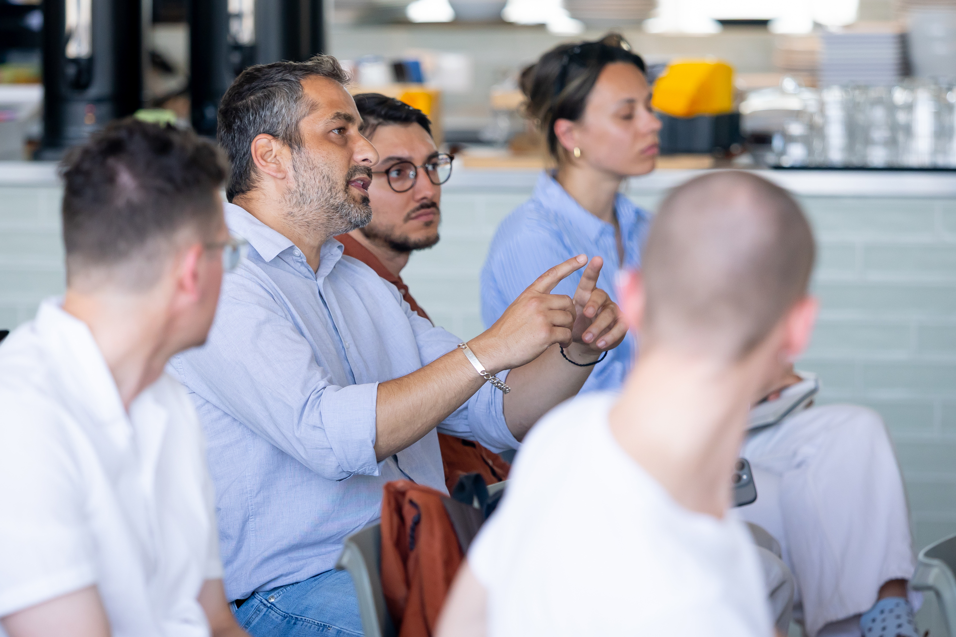 Members engaged in discussion during a chapter session