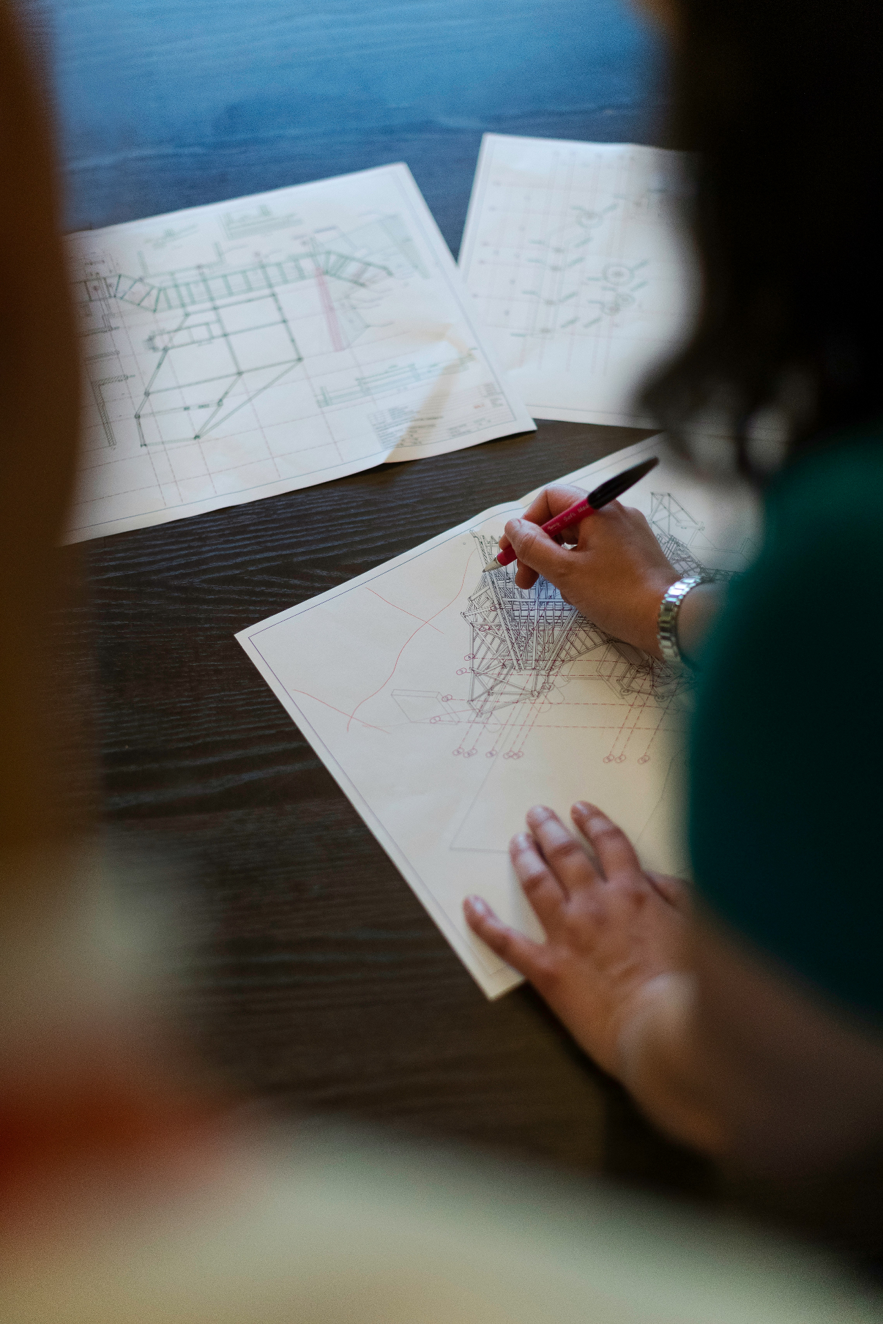 Engineer reviewing structural drawings